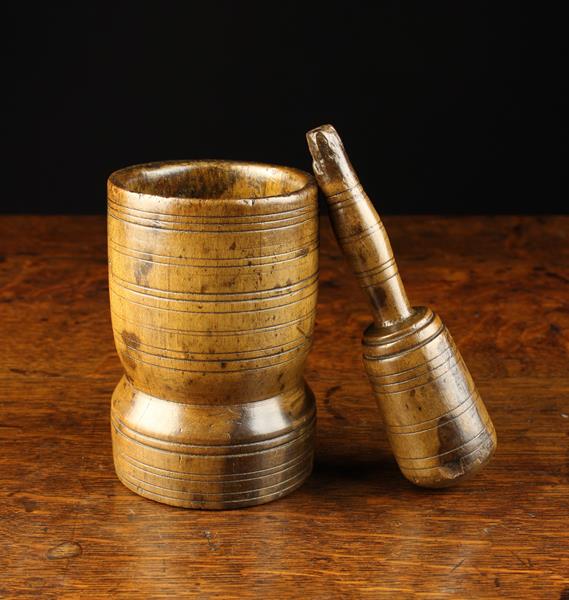 A Small 18th Century Turned Beechwood Matching Pestle & Mortar with incised ring decoration to both.