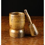 A Small 18th Century Turned Beechwood Matching Pestle & Mortar with incised ring decoration to both.