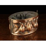 A Fine 19th Century Copper Oval Pie Mould. The hinged sides embossed with figs, 3¾" (9.