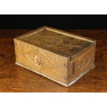 A Boarded Oak Candle-box of rectangular form; the sides secured by hand forged iron nails.