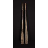 A Pair of Antique Painted Wooden Oars with leather grips, 53" (135 cm) in length (A/F).