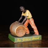 A Vintage Pub Advertising Figure modelled as a stevedore pushing a barrel with paper label to end