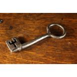 A Fine 15th/16th Century Iron Key, 4¾" x 1¾" (12 cm x 4.5 cm).