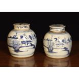 A Pair of Late Ming Blue & White Ginger Jars & covers circa 1630 (A/F) painted with lakes and