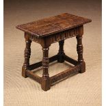 A 16th Century Style Oak Joint Stool.