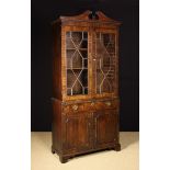 A Late George III Veneered Bookcase/Cabinet.