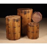 A Set of Three Graduated Stacking Oriental Wooden Packing Cases of tall octagonal form.