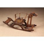 A Vintage Scumbled Pine Rocking Horse/Seat.