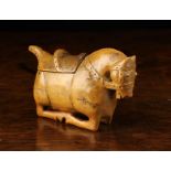 A Delightful Early 19th Century Boxwood Snuff Box carved in the form of a bridled and saddled horse.
