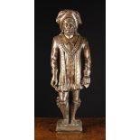 A 19th Century Carved Oak Figure of an Eminent bearded Man wearing a renaissance style costume;