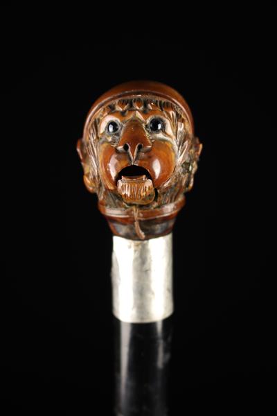 An Edwardian Silver-banded Ebonised Walking Stick with articulated Monkey's head handle. - Image 7 of 7
