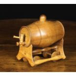 A Vintage Turned Treen Novelty Spirit Wagon bearing a ring-turned barrel with stopper top and
