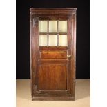 An Unusual 18th Century Oak Standing Corner Cupboard.