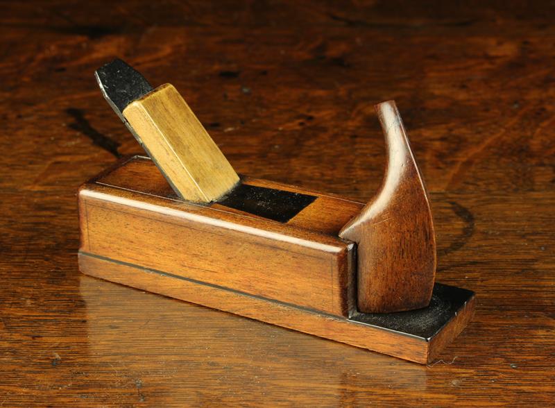 A Late 19th/Early 20th Century Mahogany & Ebony Snuff Box in the form of a carpenter's plane,