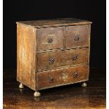An 18th Century Miniature Painted Chest of Drawers.