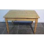 A late Victorian/Edwardian pine kitchen table - Height 73cm x 122cm x 90cm