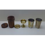 An Early 1900's leather cased Campaign/hunting 2 beaker set with measure , total height 17cm ,