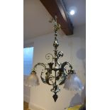 A country house brass acanthus leaf hanging ceiling light with three glass holophane shades, 100cm