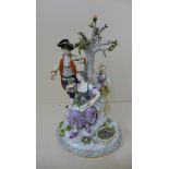 A Meissen group Apple pickers, 27cm tall, with losses to tree and foliate damage, figures appear