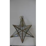 A brass star shaped hall lantern, 50cm tall x 38cm wide, no broken panes