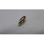 A hallmarked 9ct yellow gold ring, size N, approx 2.8 grams, some wear but generally good