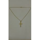 A yellow gold diamond crucifix, 3.2cm long, on a hallmarked 41cm chain, chain approx 3.5 grams,