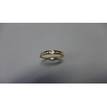An 18ct yellow gold diamond band ring, size P, approx 1.9 grams, marked 18K, generally good