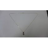 A hallmarked 9ct yellow gold diamond pendant on a fine 9ct chain, 44cm long, head approx 7mm wide,
