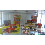 A collection of mostly boxed Hornby and other 00 gauges rolling stock, two locos and buildings and
