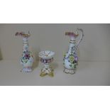 A Meissen floral encrusted scent ewer, repair to handle and foliate damage, 20cm tall and a