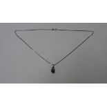 A hallmarked 9ct white gold pearl pendant on chain, 40cm long, approx total weight 3.8 grams, in
