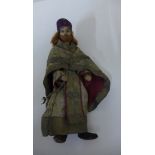 A 19th century Russian Orthodox doll in original costume, 19cm tall, please see images for condition