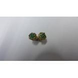 A pair of 9ct yellow gold hallmarked emerald earrings, approx 1.3 grams, generally good condition