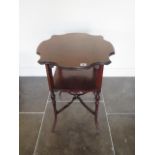 A pretty Edwardian mahogany window table with an undertier, 69cm tall x 53cm, some usage marks and