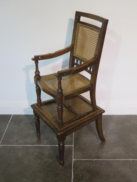 A Victorian oak child's high chair on stand with Bergere cane seat and back, chair detaches from - Image 2 of 3