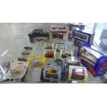 A collection of 22 diecast trucks, vans and cars including Oxford commercials, EFE