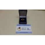 A GTV 18ct yellow gold Cassiterite, size N/O, metal weight approx 7.8 grams, with certificate and in
