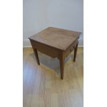 An oak stool with lift up seat, 45cm tall x 39cm 47cm