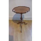 A Georgian style mahogany wine table in generally good condition, 64cm tall x 38cm diameter