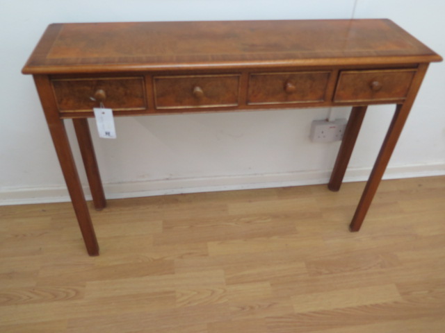 A walnut four drawer hall table made by a local craftsman to a high standard - Height 77cm x 110cm x