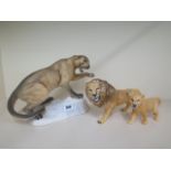 A Beswick Cougar on Rock matt 1702, a Lion and Lioness both gloss - all good condition