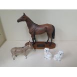 A Beswick Connoisseur figure of Red Rum , matt finish, a Beswick Donkey , a pair of Beswick