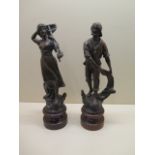 A pair of 19th century Spelter figures - Fisherman and fish girl - Height 40cm - some small wear,