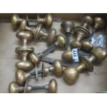 Ten pairs of brass door handles