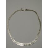 An 18ct bark effect white gold necklace - Length 43cm - approx weight 34.4 grams - in good