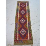 A hand knotted woollen Maimana Kilim runner - 192cm x 60cm