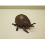 A bronze lady bird - Length 5cm