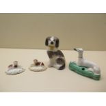 A Staffordshire pottery model greyhound pen holder together with a pair of miniature spaniels and