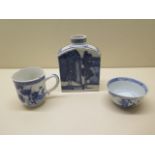 An 18th century Chinese soft paste porcelain tea caddy together with a coffee can and tea bowl -