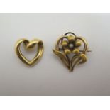 A 15ct yellow gold heart shaped floral brooch approx weight 3 grams and a heart shaped pendant